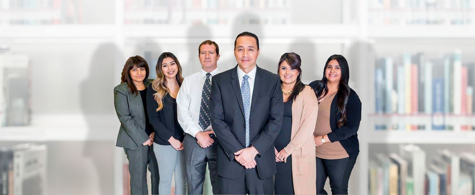 The attorneys and staff of the Law Offices of Alejo Lugo and Associates in the office