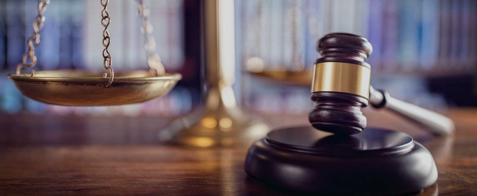Scales of justice and a gavel, as used at a probation or parole violation hearing