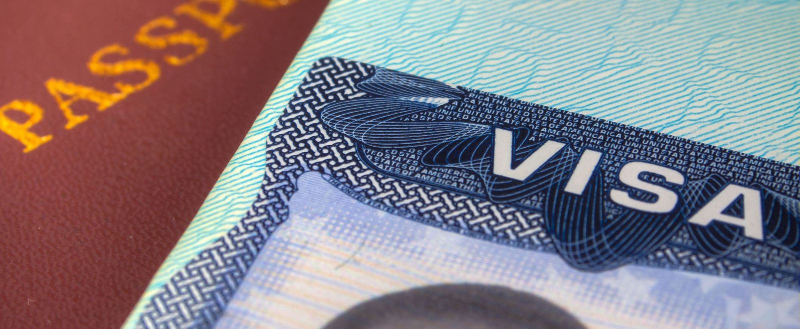 A passport and United States visa, the documents at stake in an immigration defense case