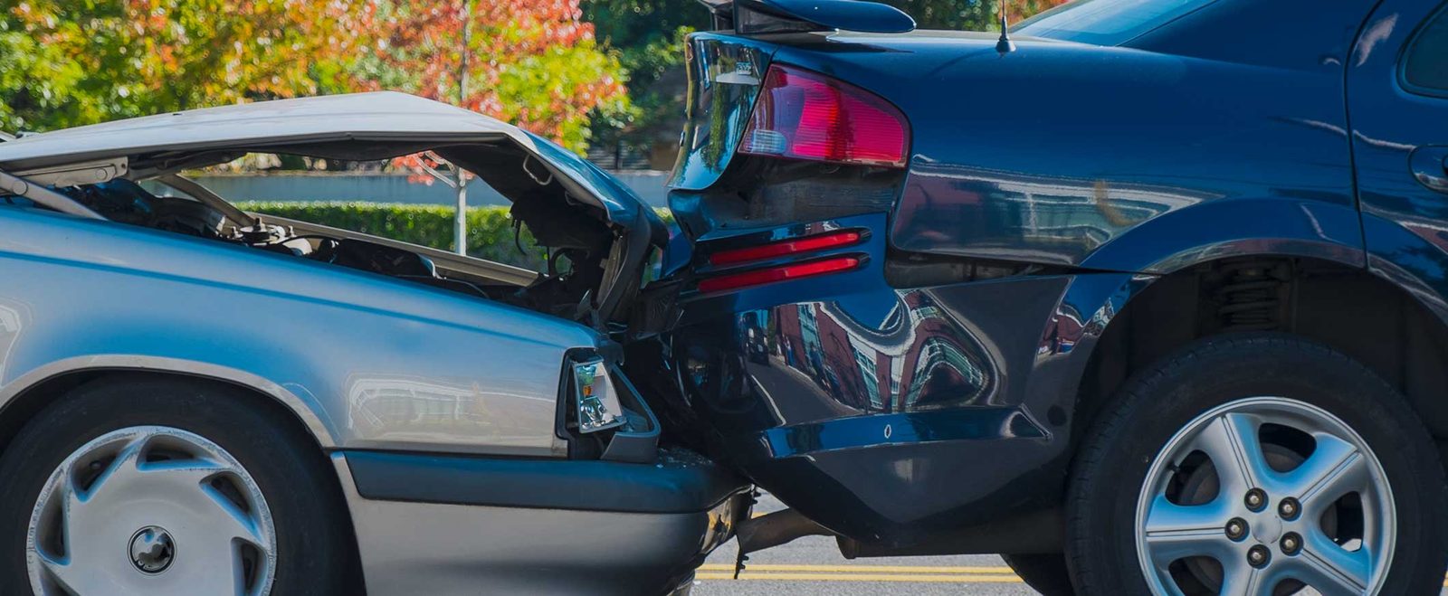 Two cars rear-ended on a residential street after a car accident
